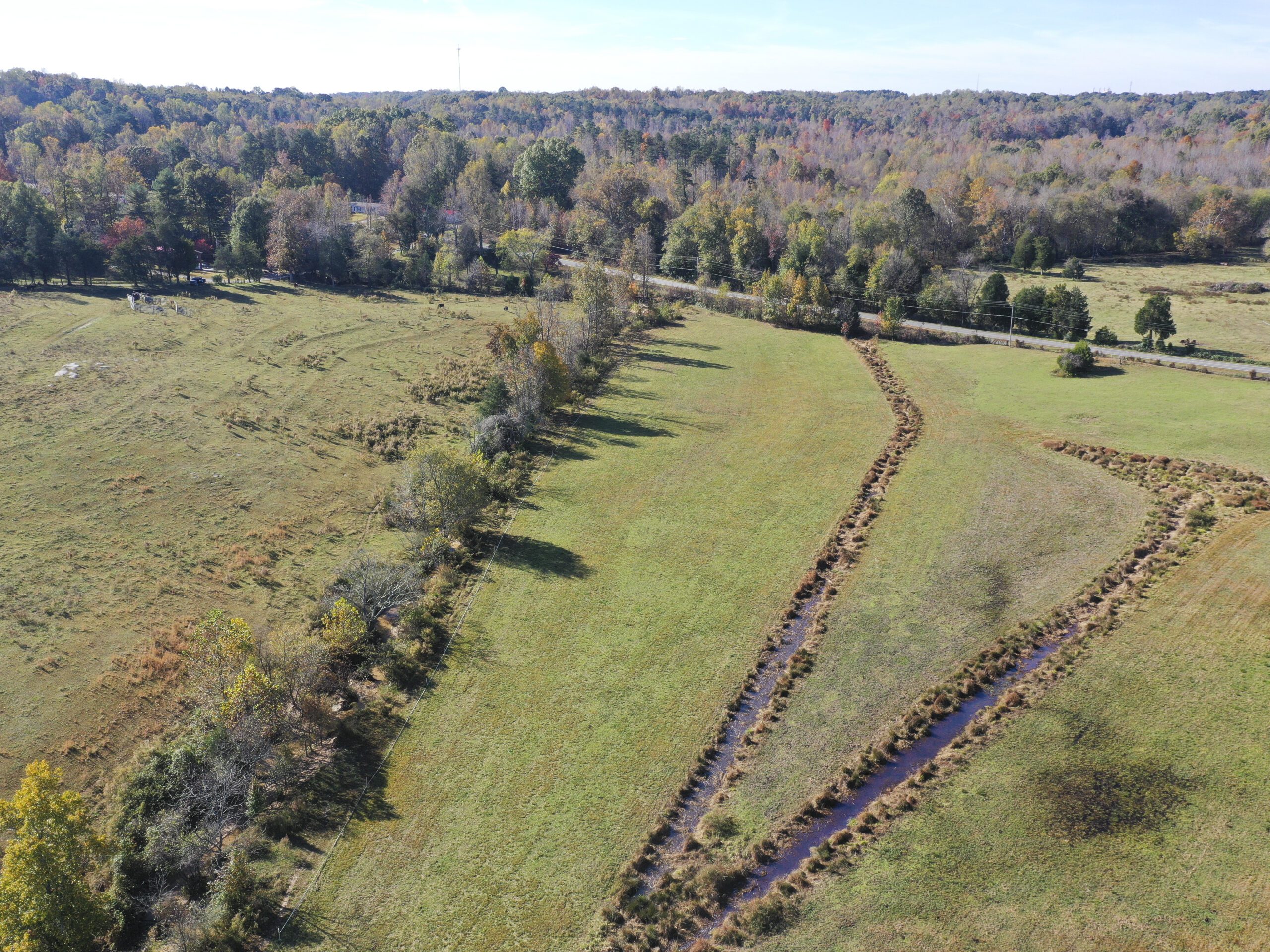 Overview drone shot of Three Creeks Farm Mitigation Site in the Yadkin Pee Dee river basin in Davidson County, North Carolina by Eco Terra - Featured Photo